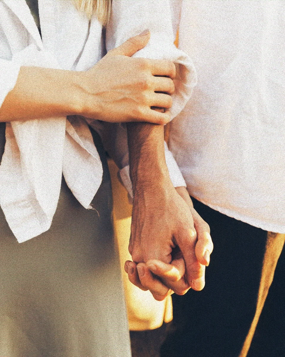 Close-up of a couple holding hands